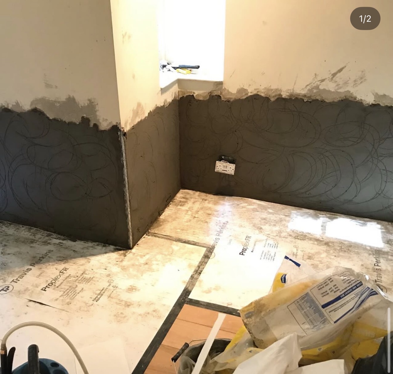 Internal wall plastering in progress