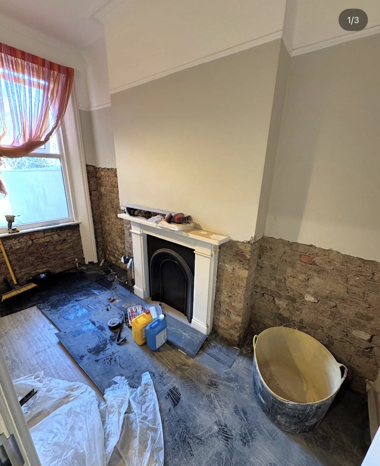 Dry Core Solutions damp treatment work showing an interior wall stripped back to brickwork