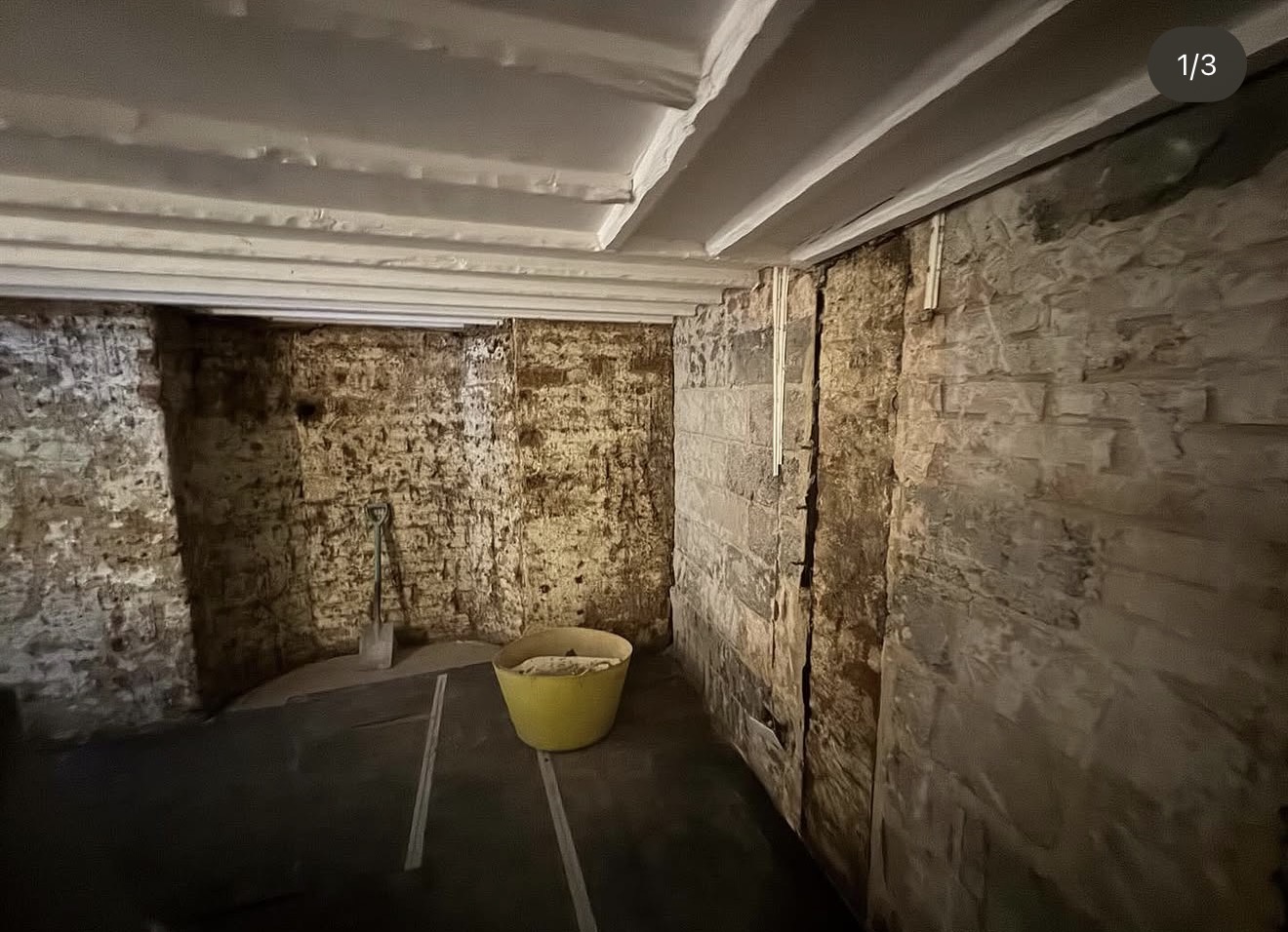 Basement project with exposed masonry before plastering