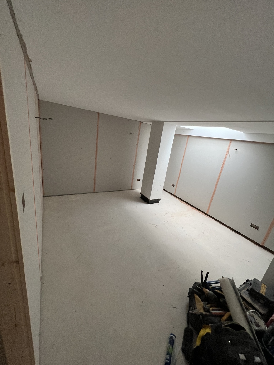 Wall lining across the basement